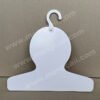 A cardboard clothes hanger customized in the shape of a cartoon character's head. The material is recyclable and biodegradable, and the hook is rotatable. It is used to display personalized clothing.