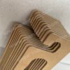 Cardboard hooks for slippers and slippers made of FSC renewable kraft cardboard, recyclable and completely biodegradable, used for displaying slippers and shoes