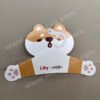 Recyclable cardboard clothes hanger produced for the Liby brand. It is shaped like a dog and is made of environmentally friendly, renewable and degradable cardboard. The hook is rotatable and is used for terminal advertising display of clothing in supermarkets.