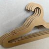 Cardboard hangers made from FSC renewable kraft paperboard, recyclable and fully biodegradable, suitable for displaying children's clothing tops and pants