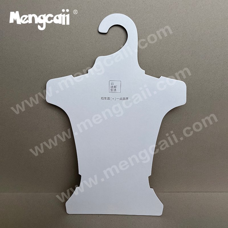 A cardboard hanger designed for aprons. It is made of environmentally friendly and renewable cardboard. The size is 36X54CM. The product is recyclable and biodegradable. It is suitable for the display of apron terminals.