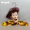 A cardboard clothes hanger made from recycled cardboard material and customized with the character Woody from Toy Story. The product is recyclable, degradable, and has a unique personalized clothing display effect.