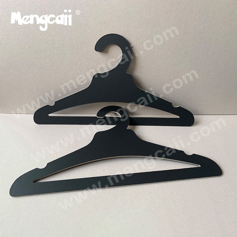 Mengcaii black cardboard clothes hanger is a high-quality, sustainable, environmentally friendly, fully recyclable and biodegradable fashionable cardboard clothes hanger, made of high-pressure composite fiber cardboard